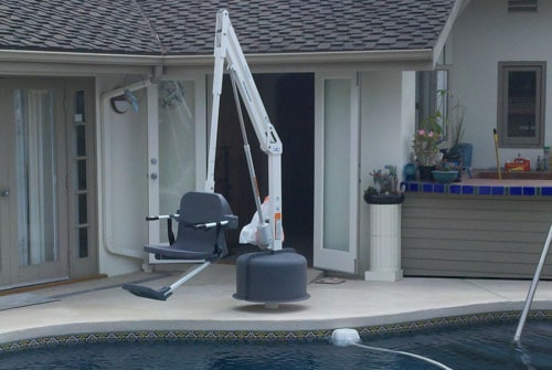 pool lift suspended over water