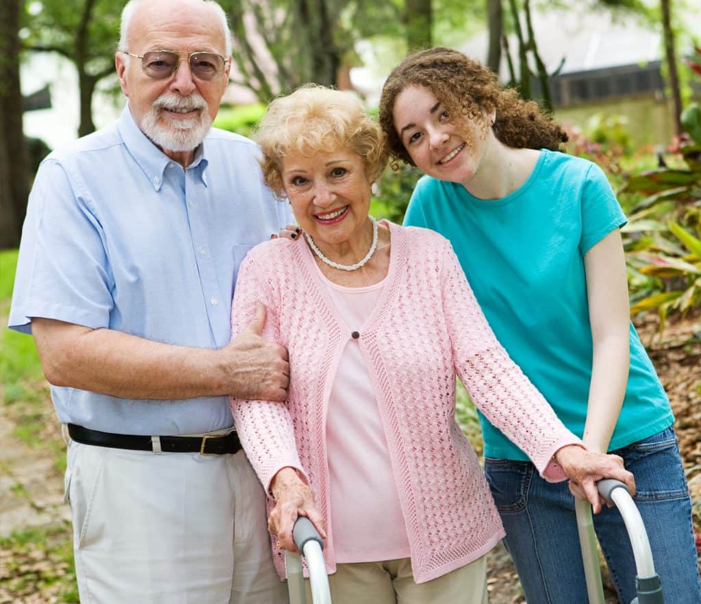 elderly couple with young adult